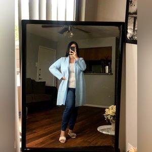 Sky blue blazer coat.